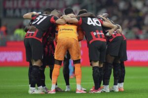 I giocatori del Milan in cerchio